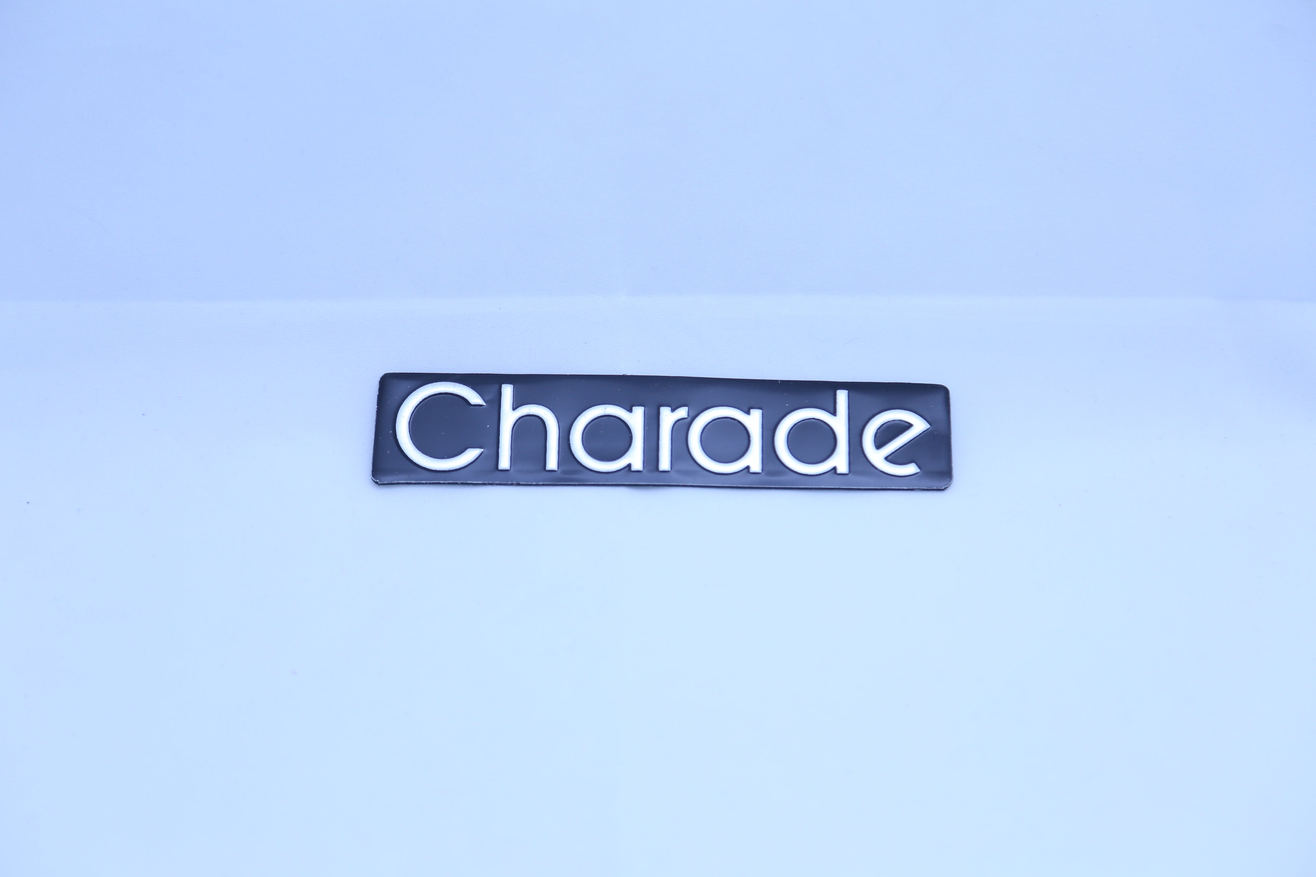 Charade Emblem 1x5.5inch-2x14cm Black LC Badge