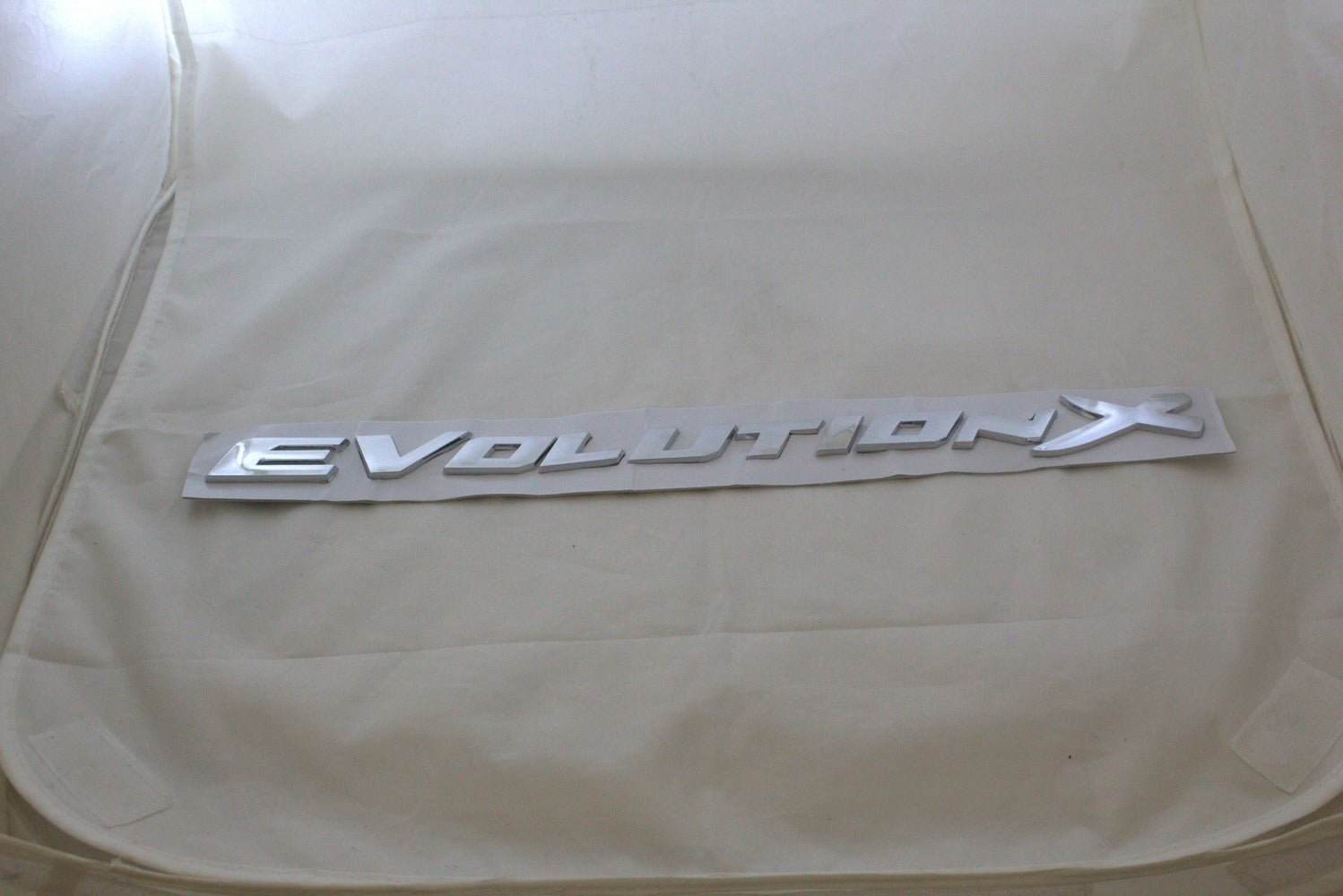 Evolution X Emblem Chrome IP Badge