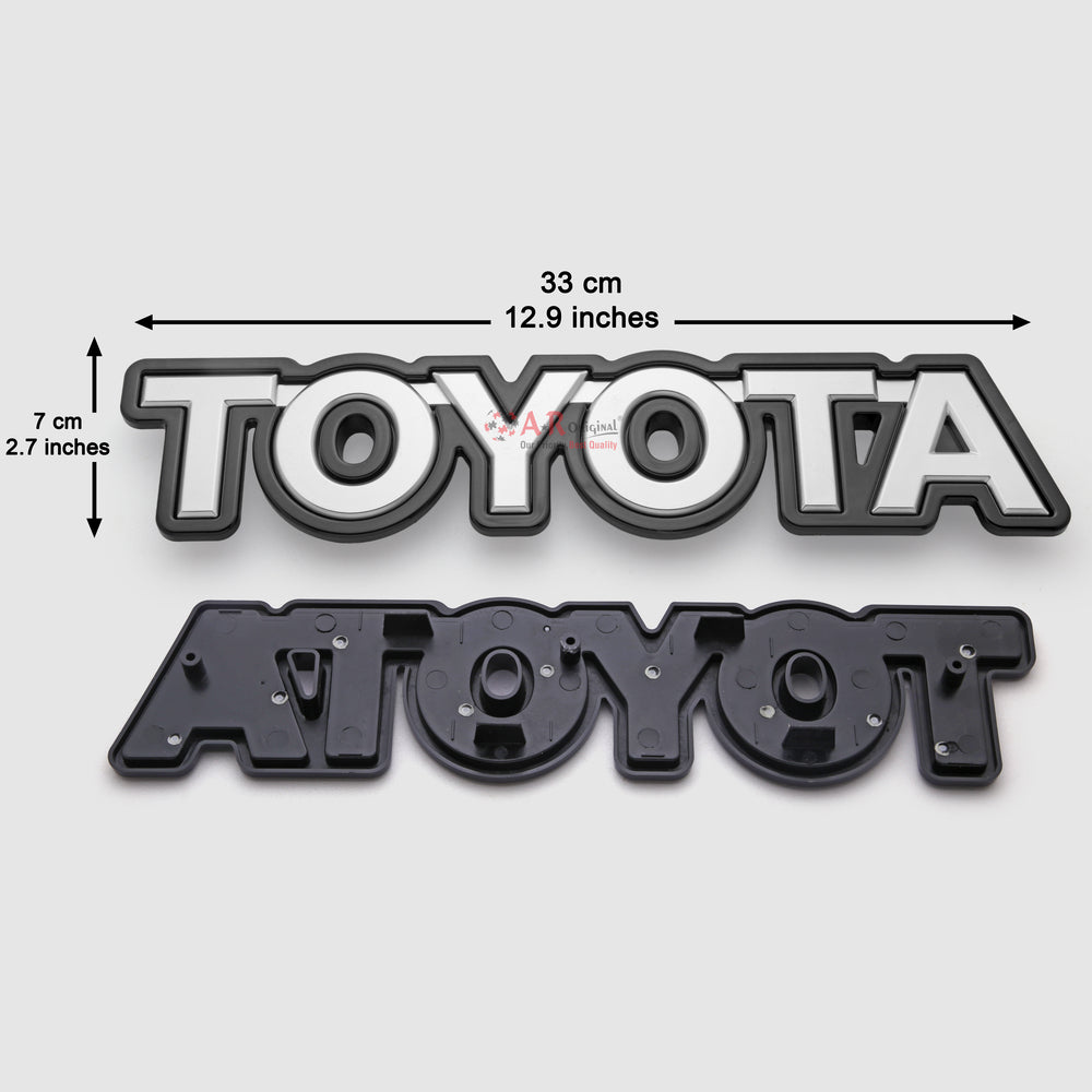 Toyota Emblem Clip Fit7x33cm Black Silver IP Badge
